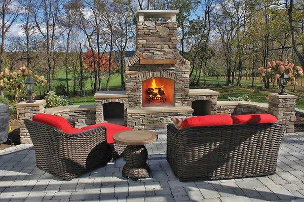 Custom Outdoor Fireplace with Wicker Furniture