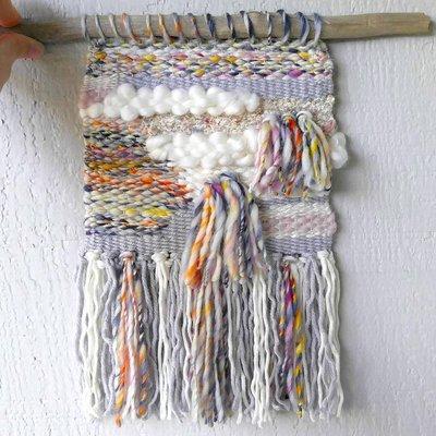 The woven wall-hanging I created using "Malala" from Manos del Uruguay (available at Avenue Yarns)