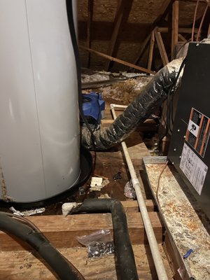 Equipment in attic to dryout plywood deck from water damage.