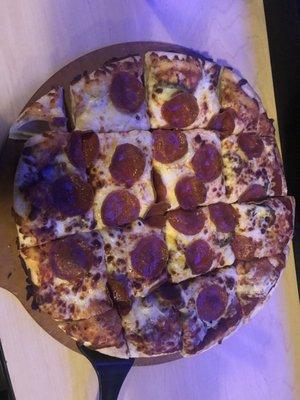 Pepperoni and jalapeño pizza