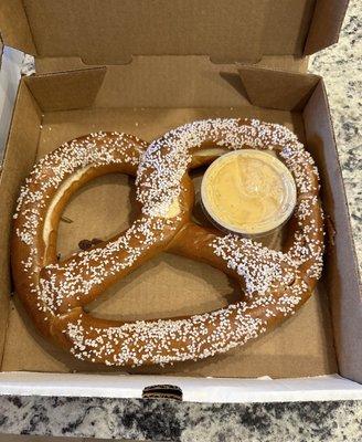 Large pretzel with beer cheese sauce