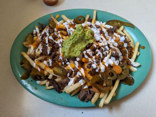 Massive carne asada crispy fries nachos! Yes sir! :+) (2 meals)