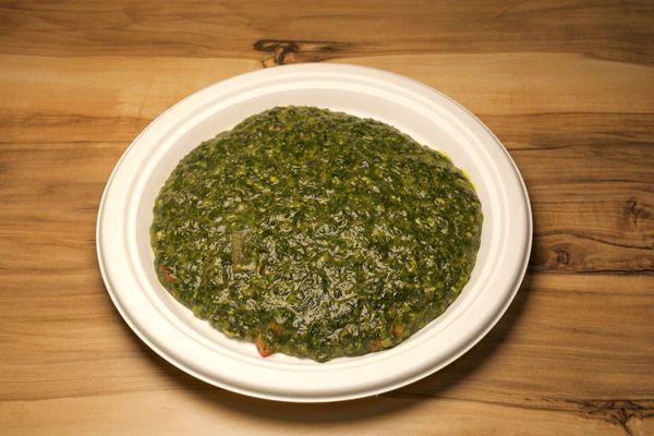 Mulukhayah is a traditional Middle Eastern dish, especially popular in Egypt. It features a hearty green leafy vegetable called jute mallow,