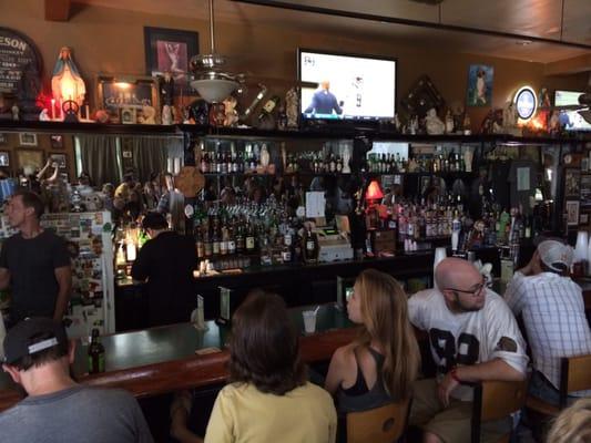 If you look in the reflection of the bar mirror, you can see a full bar room of saints fans...