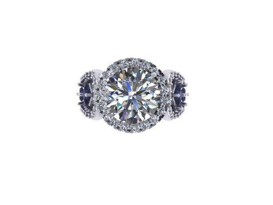 2.50 carat center diamond with side round sapphires