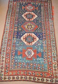 Antique Kazak rug replied and restored,