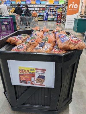 Free potatoes! Right now customers who spend ten dollars at Superior Grocers can have a free huge bag of potatoes!