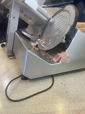 Disgusting filthy meat slicer at Jersey Mike's.