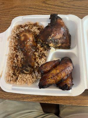 Jerk chicken thigh and leg, rice and beans and plantains