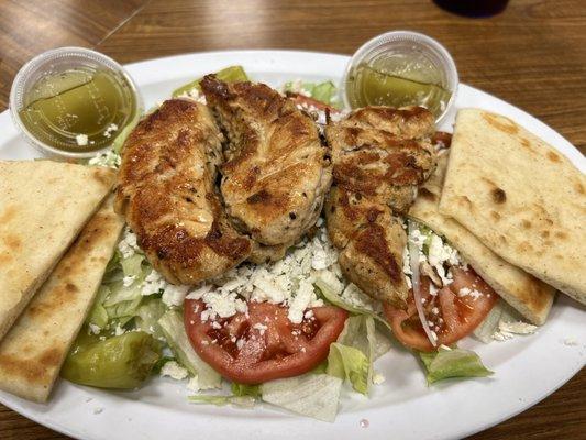 Greek salad with marinated grilled chicken and soft pita. The salad part is on the plain side, but the chicken is very nice.