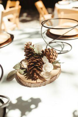 These are the centerpieces. Super cute and rustic. The metal stand is for the pizza. Photography: https://www.corazonphotography.net/