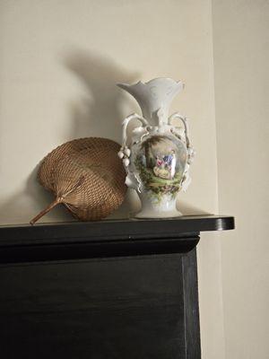 This vase on the fireplace mantel was present in this room at the time if surrender