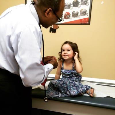 Dr. Quaye examining my 3 year old.