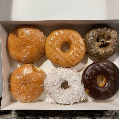 Top: mixed berry, original glaze, blueberry  Bottom: lemon, coconut, chocolate glaze