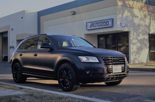 Audi SQ5 Came in for Satin Black Vinyl Wrap, as well as Brake service including painting w/ custom sticker on caliper.