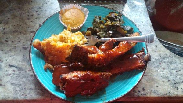 Spicy pork rib plate with collard greens and mac n cheese.