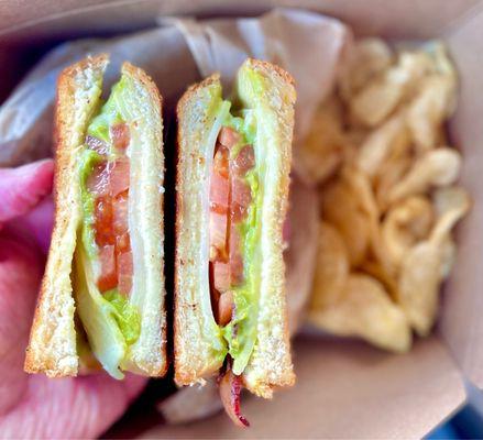 Bravo avocado sandwich w/ chips to go - cheddar, bacon, tomato, avocado with honey mustard on sourdough