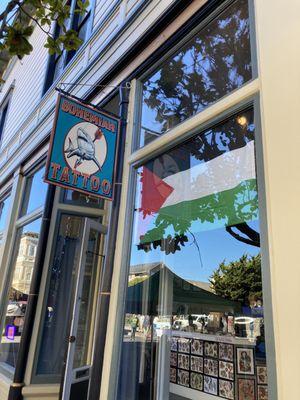 Palestinian flag hanging in the front window