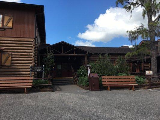 P&J's Takeout entrance between Hoop De Doo Revue to the left and Trails End on the right.