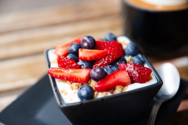 Yogurt Parfait with granola, strawberries, and blueberries