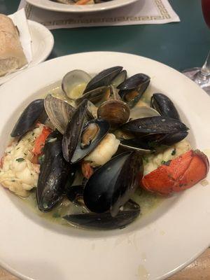 Mariscada plus a lobster tail with green sauce!