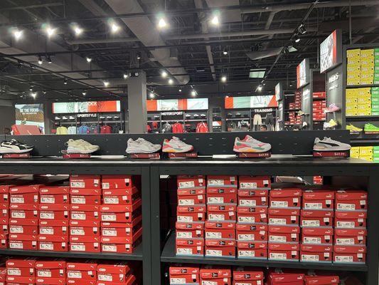 Large display of Puma sneakers.