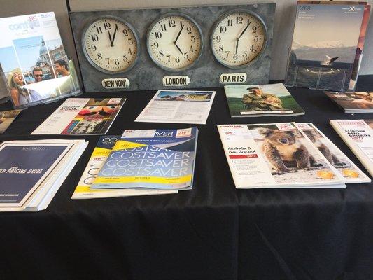 Travel brochures and world clocks