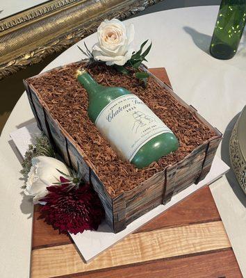 This wine bottle and crate (all edible chocolate and cake) were the PERFECT Groom's cake for the southern couple, who are wine experts.