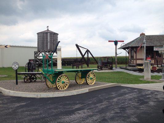 There is a collection of railroad cars, equipment and memorabilia all around the exterior of the restaurant.