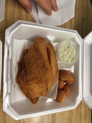 Fried tilapia with coleslaw and hush puppies