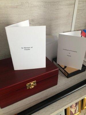 Cremation box and certificates.