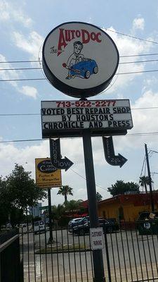 Street sign with accolades included