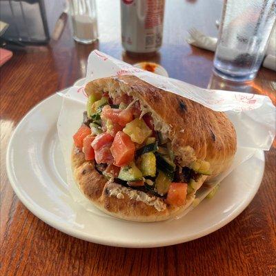 Skirt steak on pita with Israeli salad