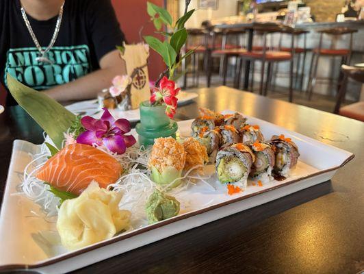 Salmon sashimi, spicy Tuna Cucumber Roll and Shrimp Tempura Roll