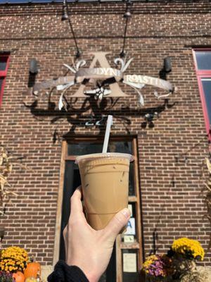 The front door of the Walker's Point Anodyne + an iced sea salt sage latte