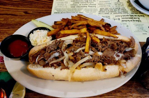 Philly Cheesesteak with swiss cheese and fries