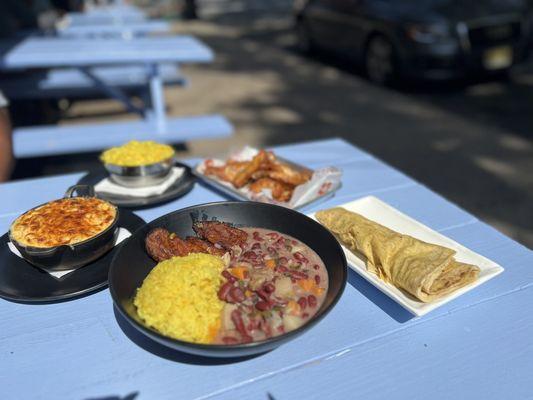 Ital stew peas, Mac n cheese, habanero honey wings, pumpkin rice, roti