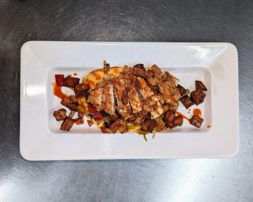 Grit plate with sweet potato hash, bacon, and our Gluten Free crispy fried Southern chicken