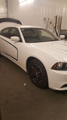 2014 Dodge Charger in the shop getting ready to get a Back Glass Replacement.