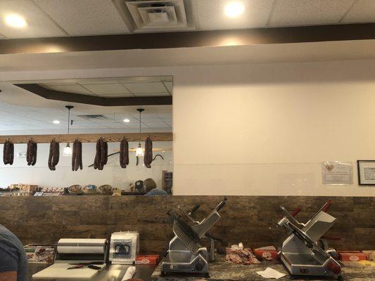 Meat slicers, and Keibasi hanging to dry out.