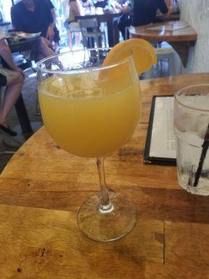 Mimosa... perfect for Sunday. Too bad they no longer have the Coconut Vegan Burger. I came hungry and got stuck with hummus and celery. :(