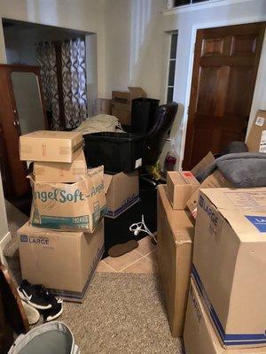 Stacked boxes that needed to go upstairs, blocking our front door and part of the stairs