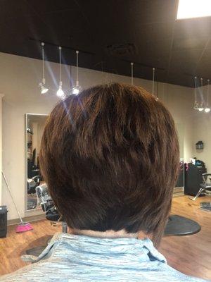 Shirley takes a asymmetric cut to a new level! And I love the copper shimmer that shows the layers in the cut. Loads of shine!