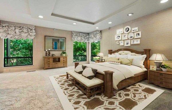 Spacious master suite w/mirrored closets, skylights, large vanity, sunken tub, shower