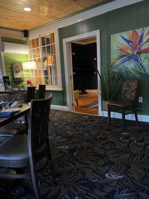 The enclosed porch dining room