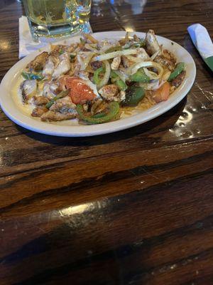 Pollo enquesado (lunch portion) and added fajita veggies (no extra charge).  Tasty, filling lunch for about $10.