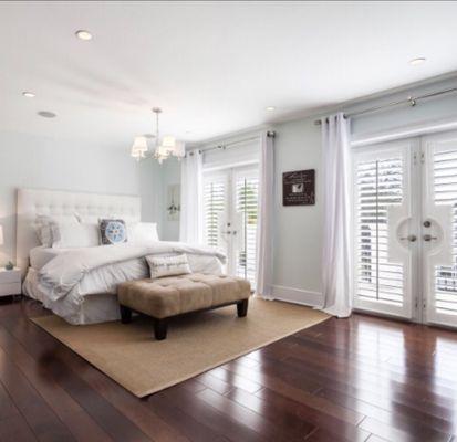 Master bedroom showing the wood floors and true plantation shutters.