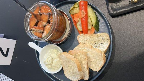 Tinned Wild Alaskan classic salmon paired with aioli, crostini and pickled vegetables