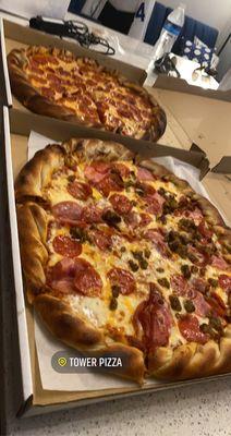 Large pepperoni pizza and large rock island pizza which is pepperoni, Canadian bacon and sausage!