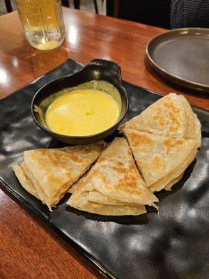 paratha with coconut curry dip